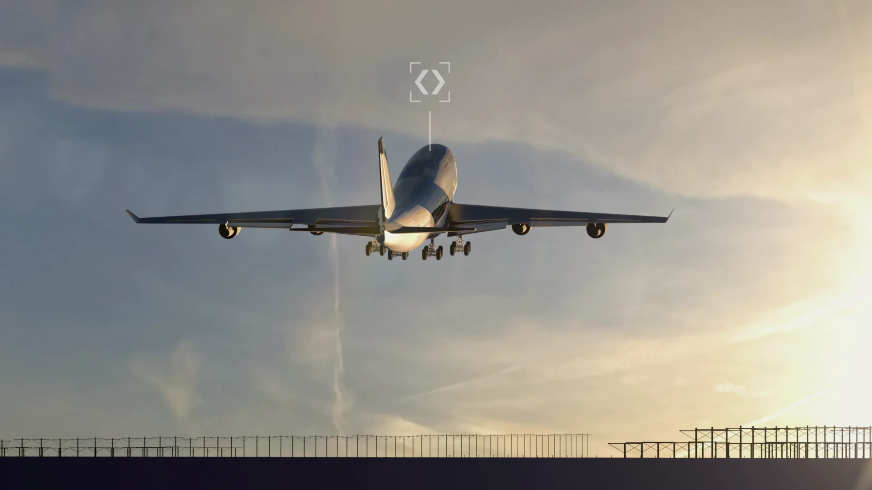 A wide-body passenger jet taking off over runway approach lights at dusk